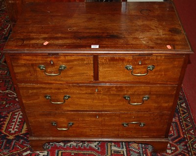Lot 1205 - A 19th century mahogany low chest of two short...