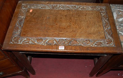 Lot 1222 - An early 20th century floral relief carved oak...