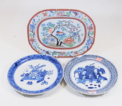 Lot 179 - A blue and white plate, in the Chinese style,...
