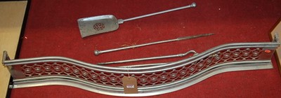 Lot 1078 - A 19th century steel Serpentine fire fender,...