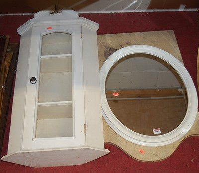 Lot 1082 - A modern white painted oval wall mirror,...