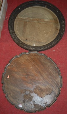 Lot 1084 - An oak framed and ball applied circular wall...
