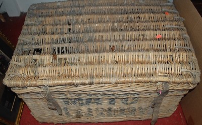 Lot 1095 - A wicker trunk with leather straps, and...