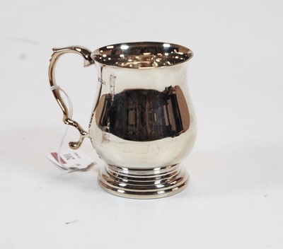 Lot 201 - A modern silver christening tankard, of bell...
