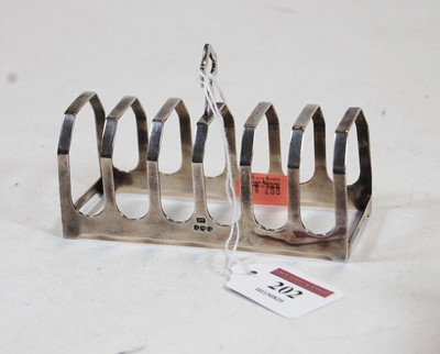 Lot 202 - A mid-20th century silver six division toast...