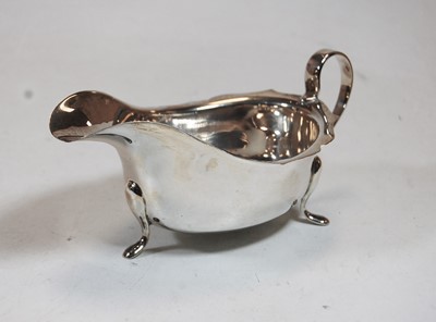 Lot 210 - A modern silver sauceboat, of plain...