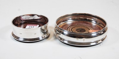Lot 215 - A modern silver bottle coaster, of squat...