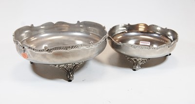 Lot 219 - A large white metal table bowl, of shaped...