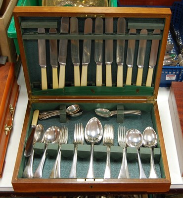 Lot 229 - An early 20th century walnut cased canteen of...