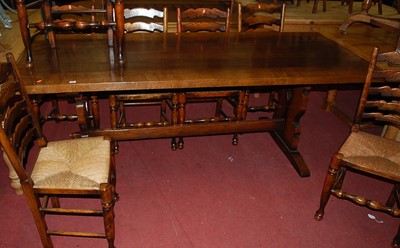 Lot 1263 - A contemporary oak long trestle end refectory...