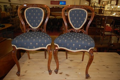 Lot 1272 - A pair of mid-Victorian mahogany balloon back...