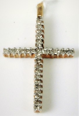 Lot 303 - A 9ct gold diamond point set cross pendant,...