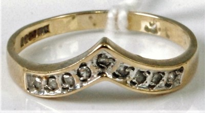 Lot 305 - A 9ct gold diamond point set 'wishbone' ring,...