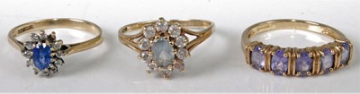 Lot 308 - A 9ct gold, blue and white stone cluster ring;...