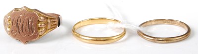 Lot 311 - A 22ct gold wedding band, 2.3g; together with...