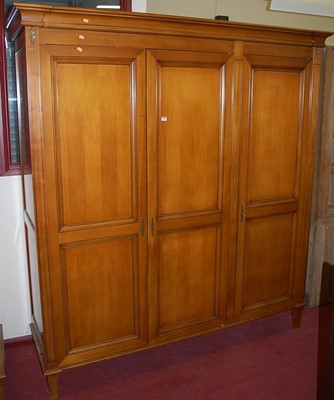 Lot 1147 - A contemporary French style cherry wood three...