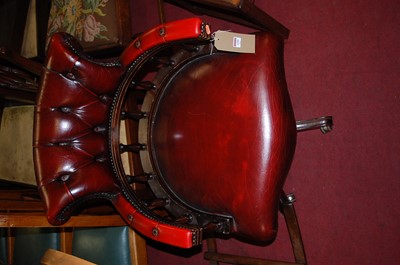 Lot 1299 - A reproduction mahogany and oxblood red...