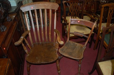 Lot 1301 - An early 20th century elm seat and beech slat...