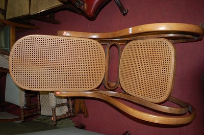 Lot 1304 - A bentwood and cane inset rocking armchair,...