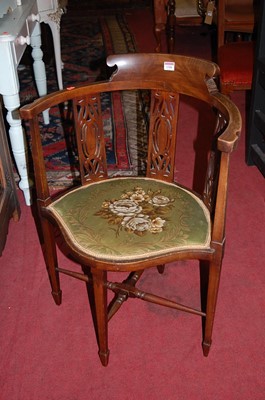 Lot 1306 - An Edwardian mahogany tub elbow chair with...
