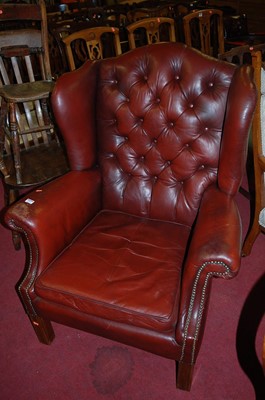 Lot 1307 - A contemporary tan leather studded and...