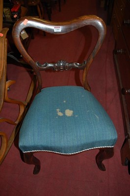 Lot 1309 - A Victorian rosewood balloon back single salon...