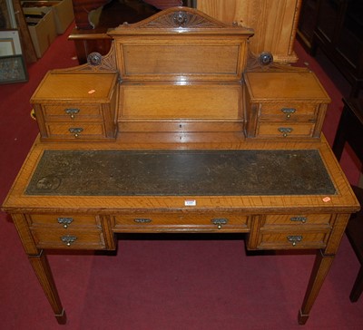 Lot 1330 - A good late Victorian light oak ledgeback...