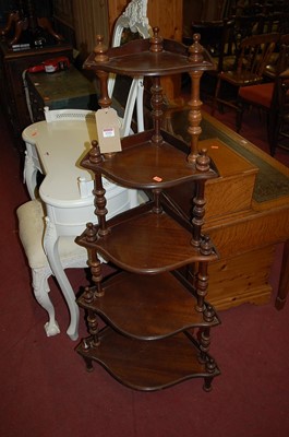 Lot 1332 - A reproduction beech five-tier corner...