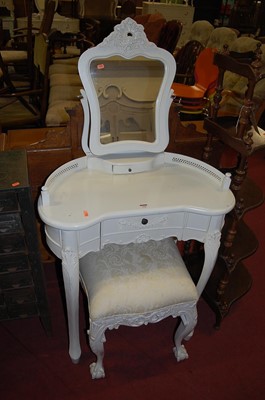 Lot 1333 - A contemporary French style white wood kidney...