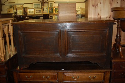 Lot 1338 - An 18th century provincial oak hinge top twin...