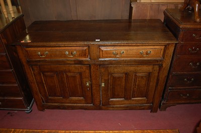 Lot 1339 - An 18th century provincial joined oak dresser...