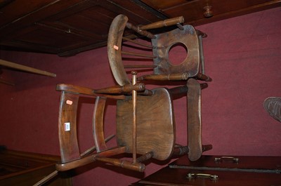 Lot 1341 - An early 20th century child's elm seat and...