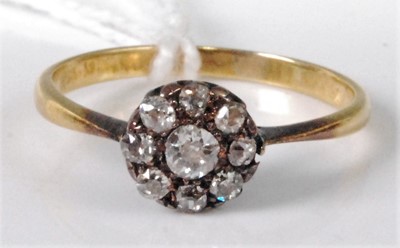 Lot 312 - A yellow metal diamond flower head cluster...