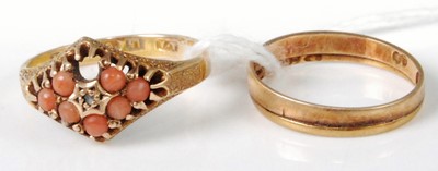 Lot 313 - A 15ct gold and coral set ring (one coral...