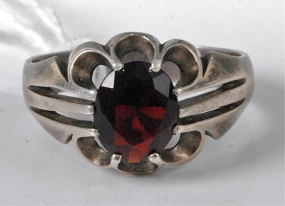 Lot 326 - A gent's silver and red hardstone set ring,...
