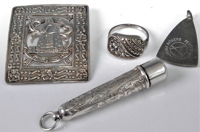 Lot 327 - A Peruvian silver and embossed brooch;...