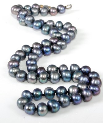 Lot 337 - A modern grey cultured pearl single string...
