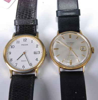 Lot 343 - A Pulsar quartz gent's wristwatch, with date...