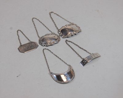 Lot 406 - Three various silver decanter collars,...