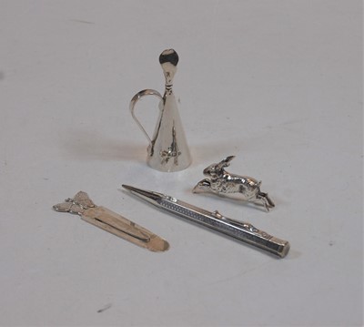 Lot 407 - A modern Arts & Crafts hammered silver conical...