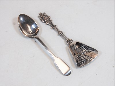 Lot 420 - A Dutch white metal caddy spoon; together with...