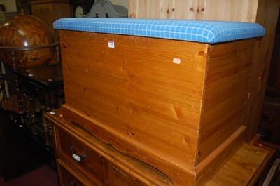 Lot 1348 - A modern pine upholstered hinge top ottoman,...