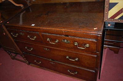 Lot 1353 - An early 19th century provincial oak chest of...