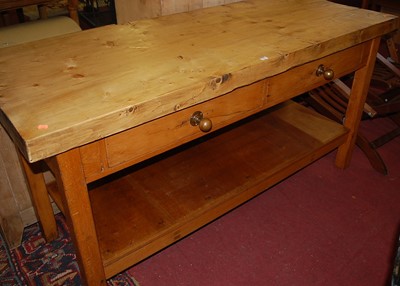 Lot 1254 - A pine plank topped long kitchen preparation...