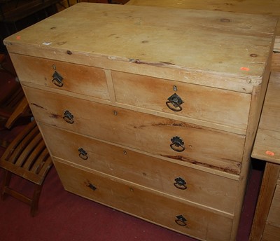 Lot 1256 - A reclaimed pine chest of two short over three...