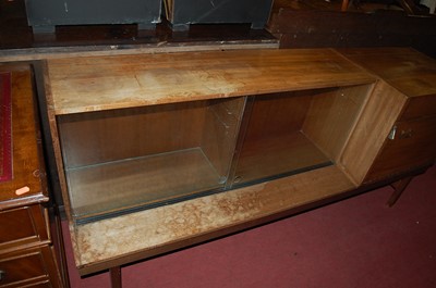 Lot 1359 - A 1970s G-Plan teak low modular side cabinet,...