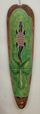 Lot 435 - A modern tourist tribal style wall mask in the...
