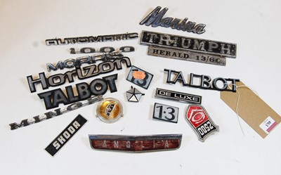 Lot 463 - A collection of assorted car model badges to...