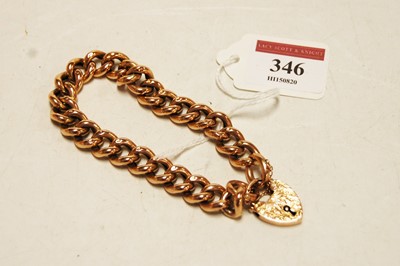 Lot 346 - A 9ct gold curblink bracelet with heart shape...
