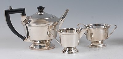 Lot 81 - An Art Deco silver bachelors three-piece tea...